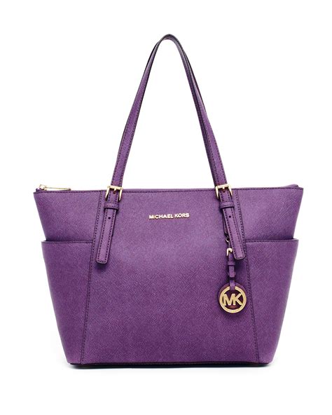 purple michael kors purse with design on front|Michael Kors purple handbags.